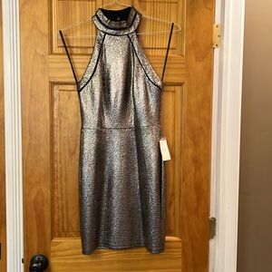 High neck, sleeveless, shiny black and gold, form fitting dress, Homecoming